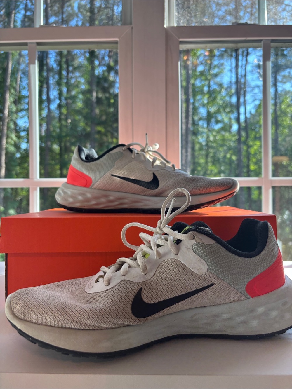Nike blue and orange running shoes